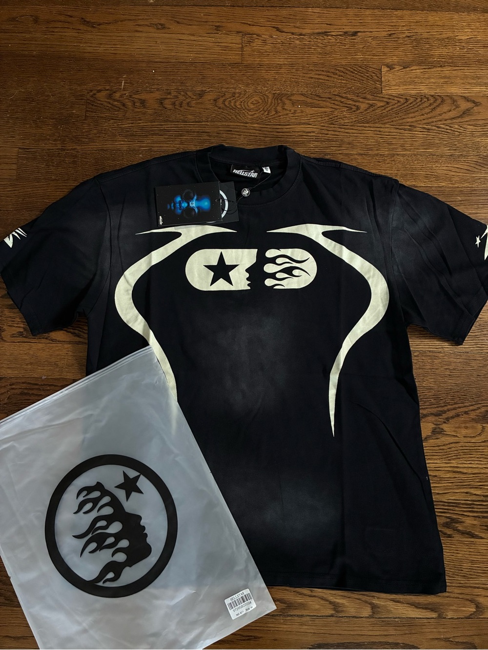 Black Short-Sleeve Graphic Tee with Cream Emblem